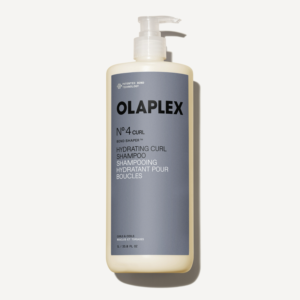 hover

Olaplex Nº.4CURL Bond Shaper Hydrating Curl Shampoo texture shot. 

Clear gel like goop on a gray background - alternate view
