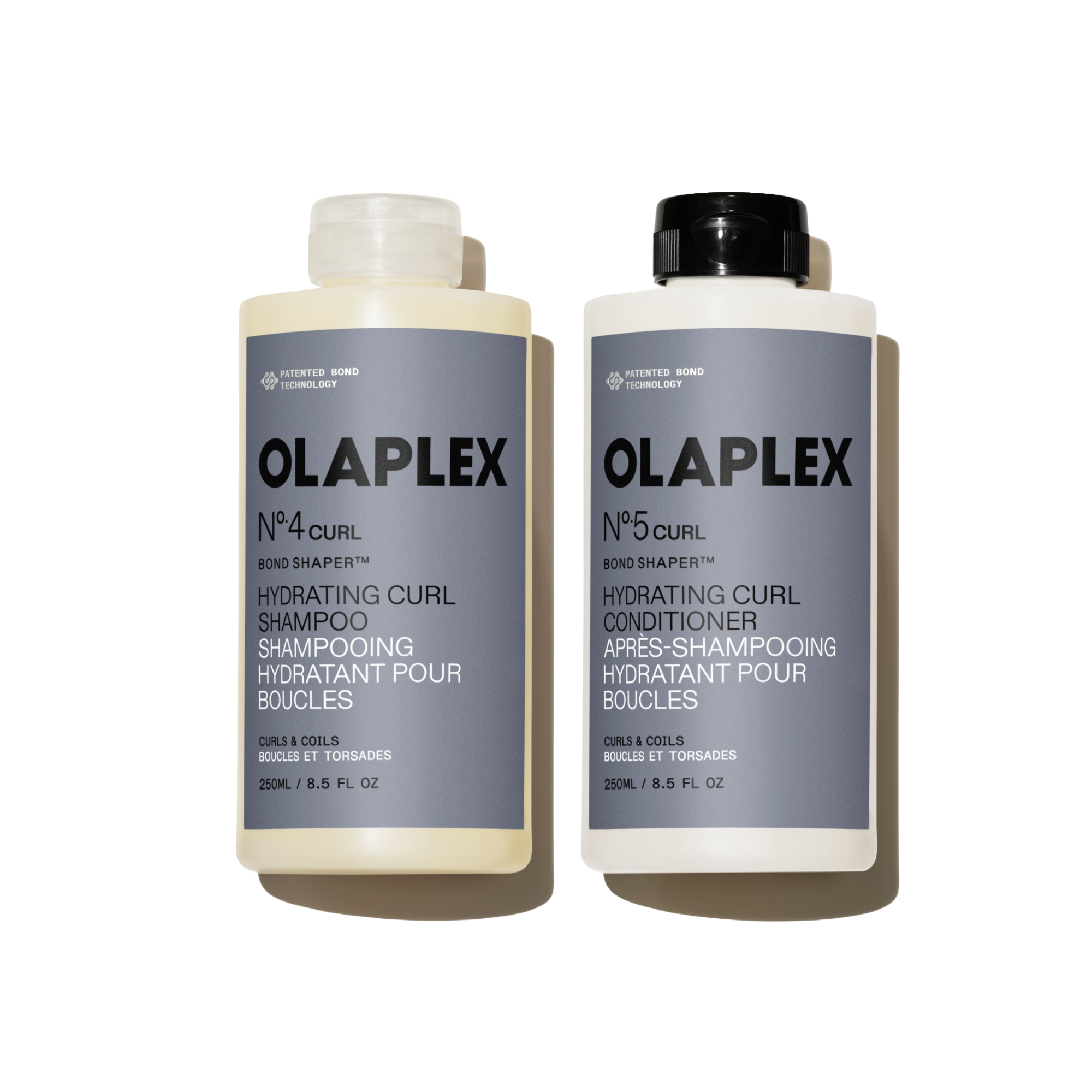 OLAPLEX Nº.4CURL Shampooing Hydratant pour Boucles et Nº.5CURL Revitalisant Hydratant pour Boucles 250ML duo sur un fond transparent.